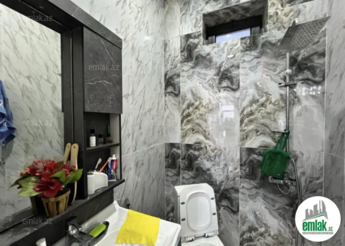 Satılır 4 otaqlı mənzil 140 m²