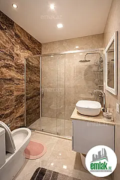 Satılır 2 otaqlı yeni tikili 55 m²