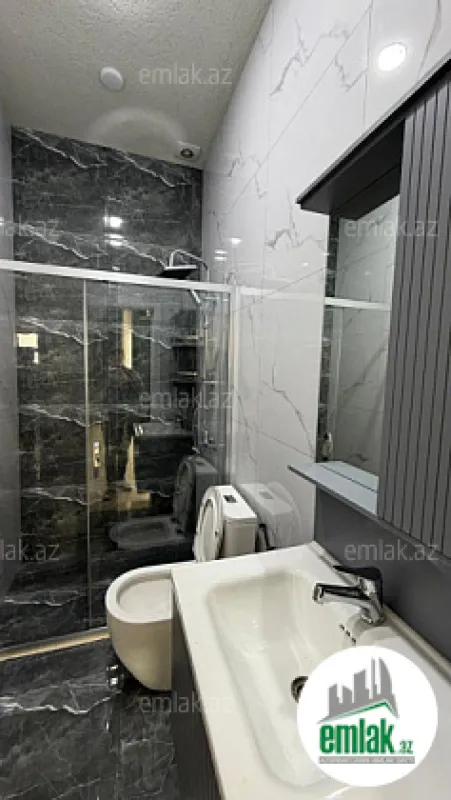 Satılır 4 otaqlı mənzil 140 m²
