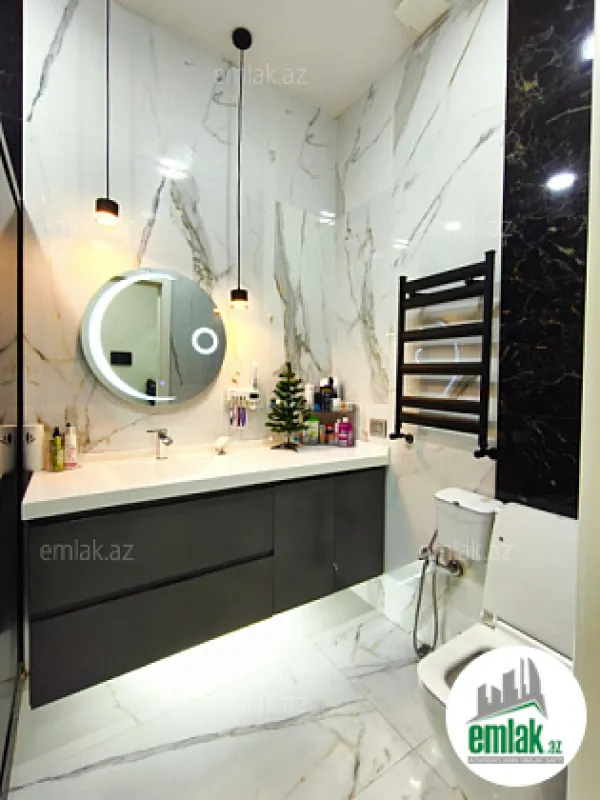 Satılır 3 otaqlı yeni tikili 100 m²