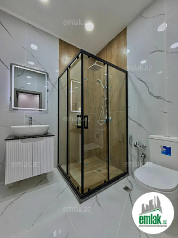 Satılır 4 otaqlı mənzil 180 m²