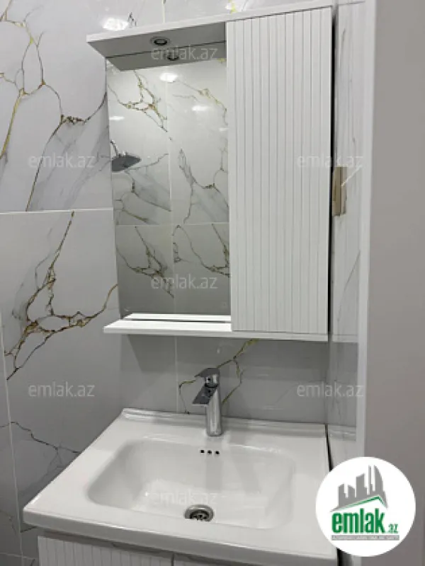 Satılır 2 otaqlı yeni tikili 60 m²