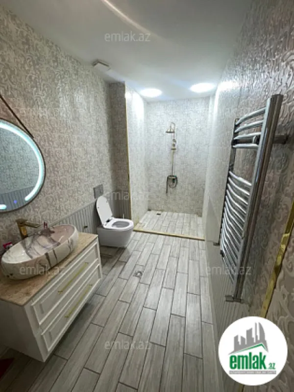 Satılır 3 otaqlı yeni tikili 100 m²