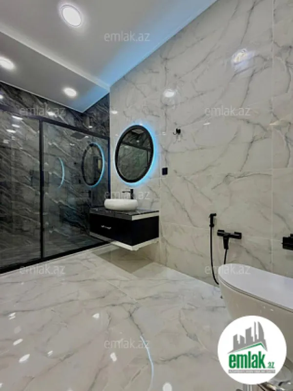 Satılır 4 otaqlı mənzil 202 m²