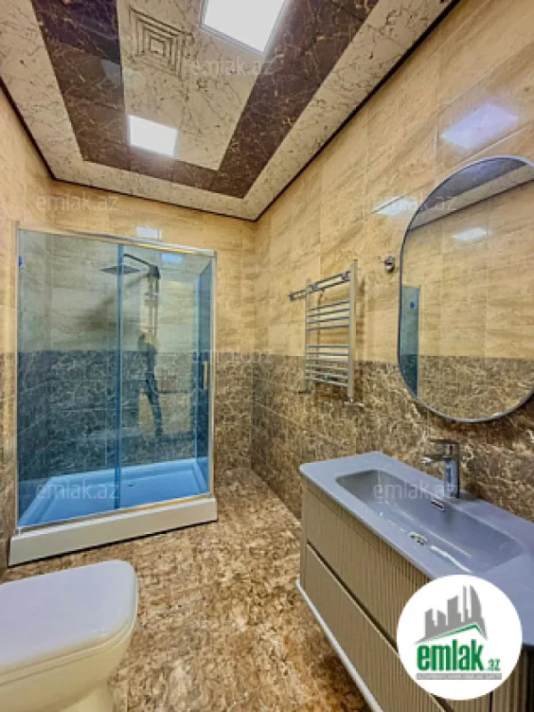Satılır 4 otaqlı mənzil 180 m²