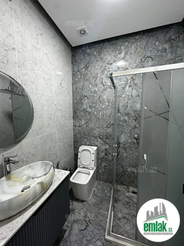 Satılır 4 otaqlı mənzil 150 m²