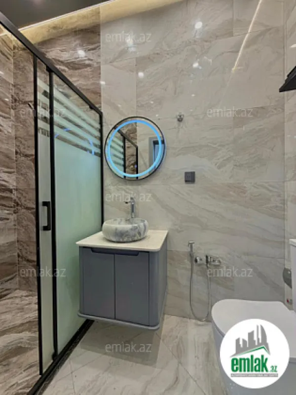 Satılır 4 otaqlı mənzil 135 m²