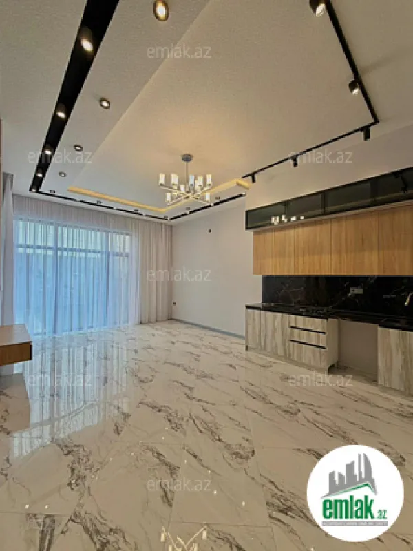 Satılır 4 otaqlı mənzil 135 m²
