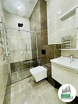 Satılır 2 otaqlı yeni tikili 60 m²