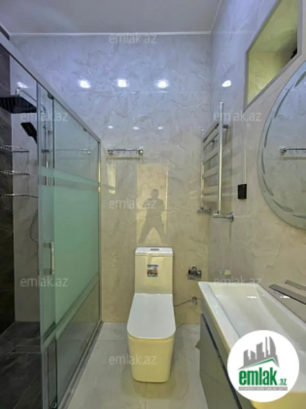Satılır 4 otaqlı mənzil 140 m²