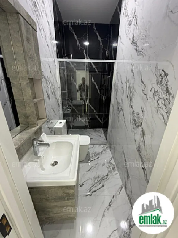 Satılır 4 otaqlı mənzil 100 m²