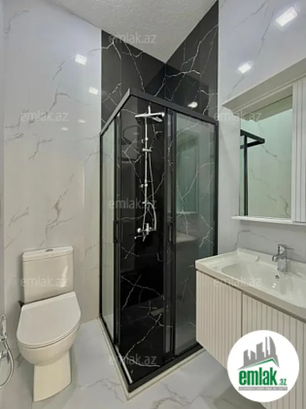 Satılır 4 otaqlı mənzil 130 m²