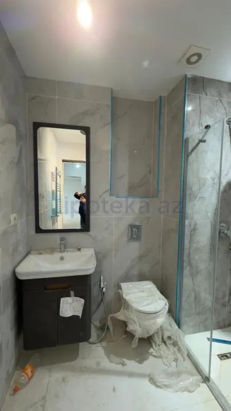 Satılır 2 otaqlı yeni tikili 63 m²