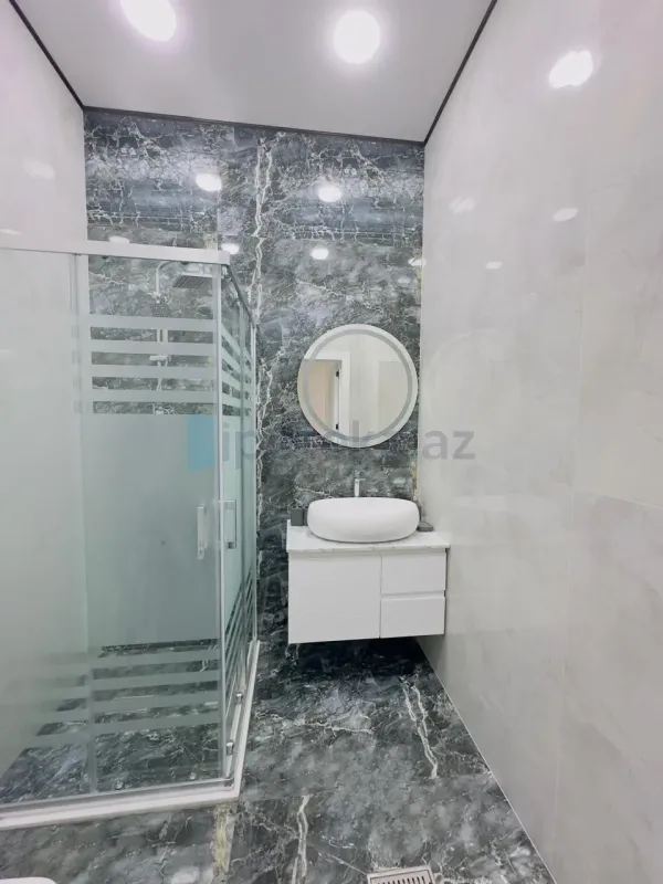 Satılır 4 otaqlı mənzil 140 m²