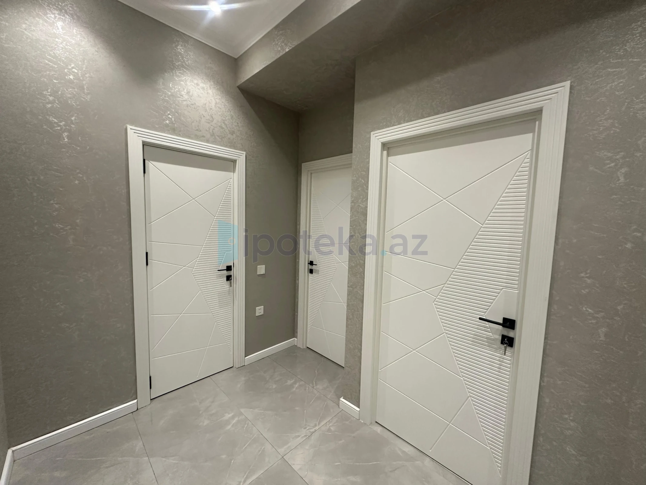 Satılır 2 otaqlı yeni tikili 59 m²