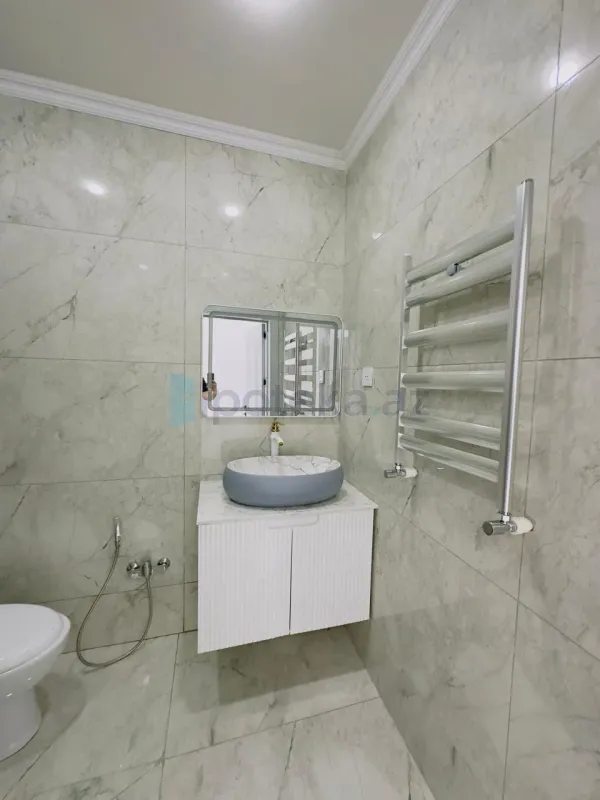 Satılır 4 otaqlı mənzil 140 m²