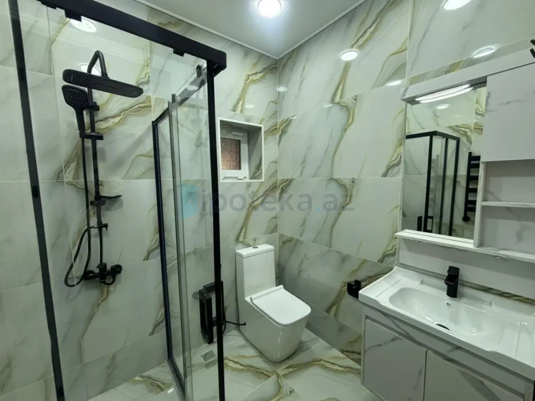 Satılır 4 otaqlı mənzil 155 m²