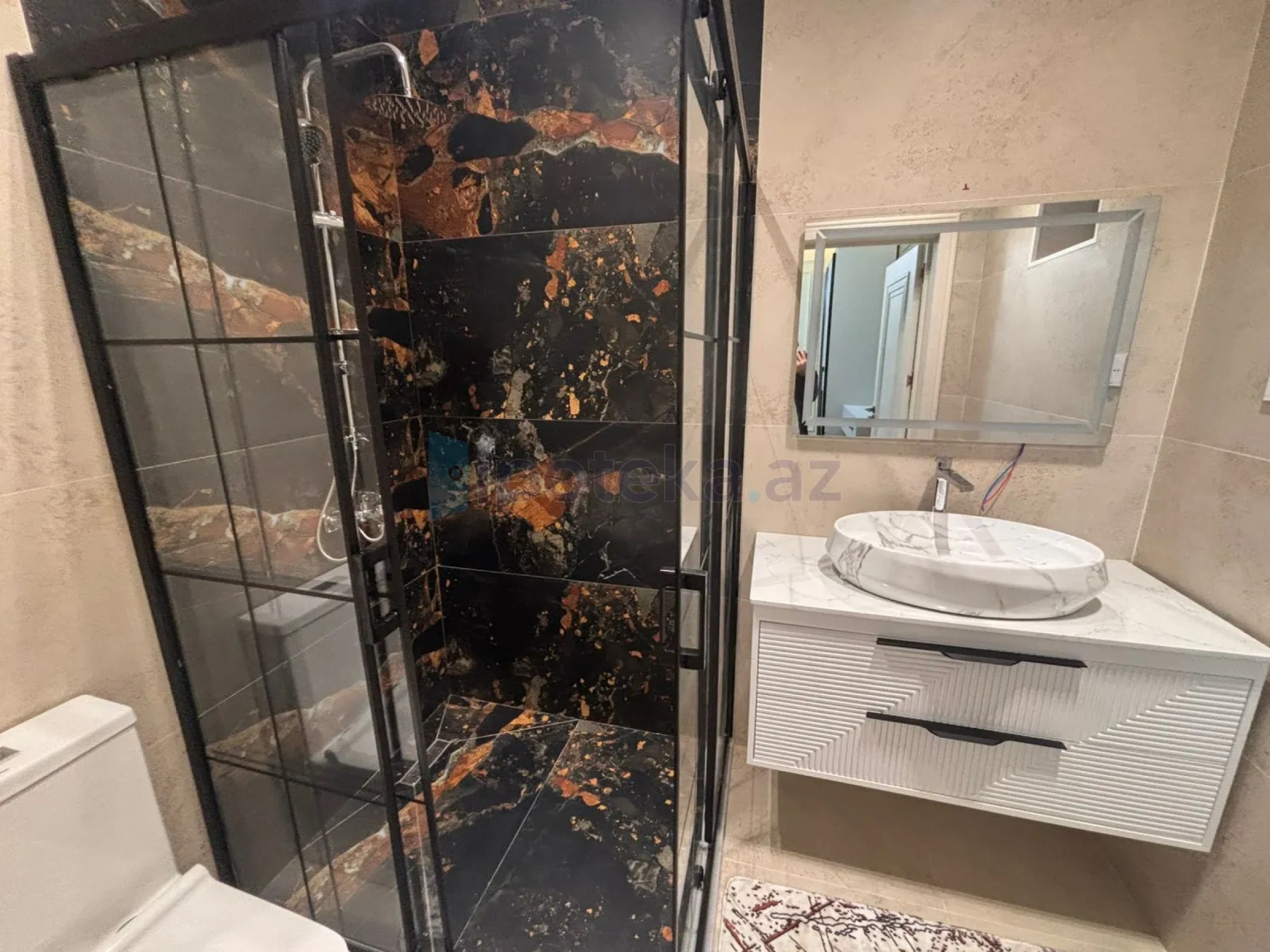 Satılır 4 otaqlı mənzil 165 m²