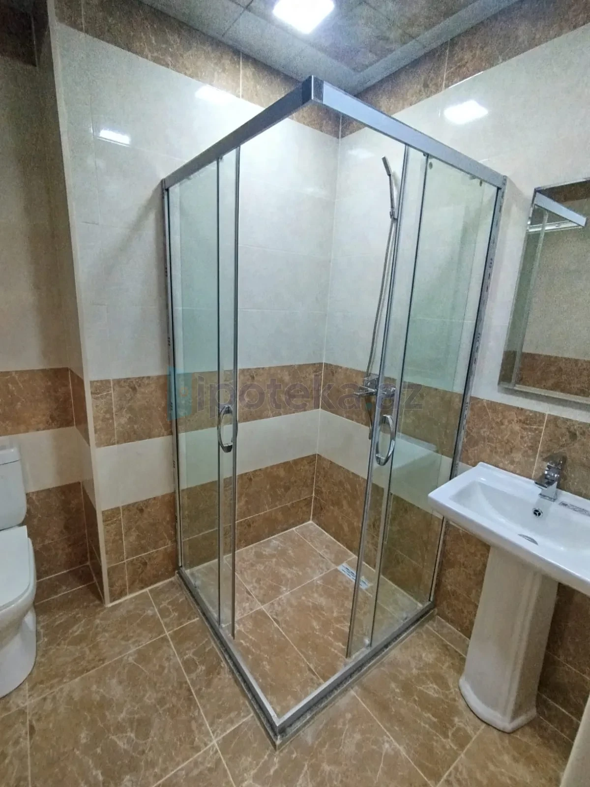 Satılır 2 otaqlı yeni tikili 60 m²