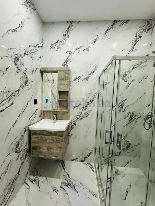 Satılır 4 otaqlı mənzil 130 m²