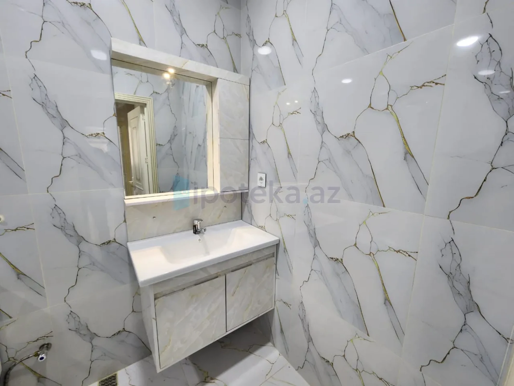 Satılır 2 otaqlı yeni tikili 64.2 m²