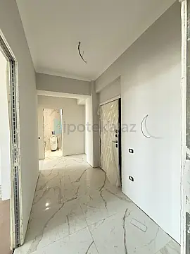Satılır 2 otaqlı yeni tikili 72.56 m²
