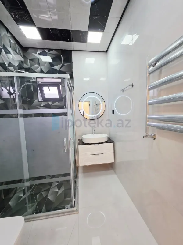 Satılır 4 otaqlı mənzil 170 m²