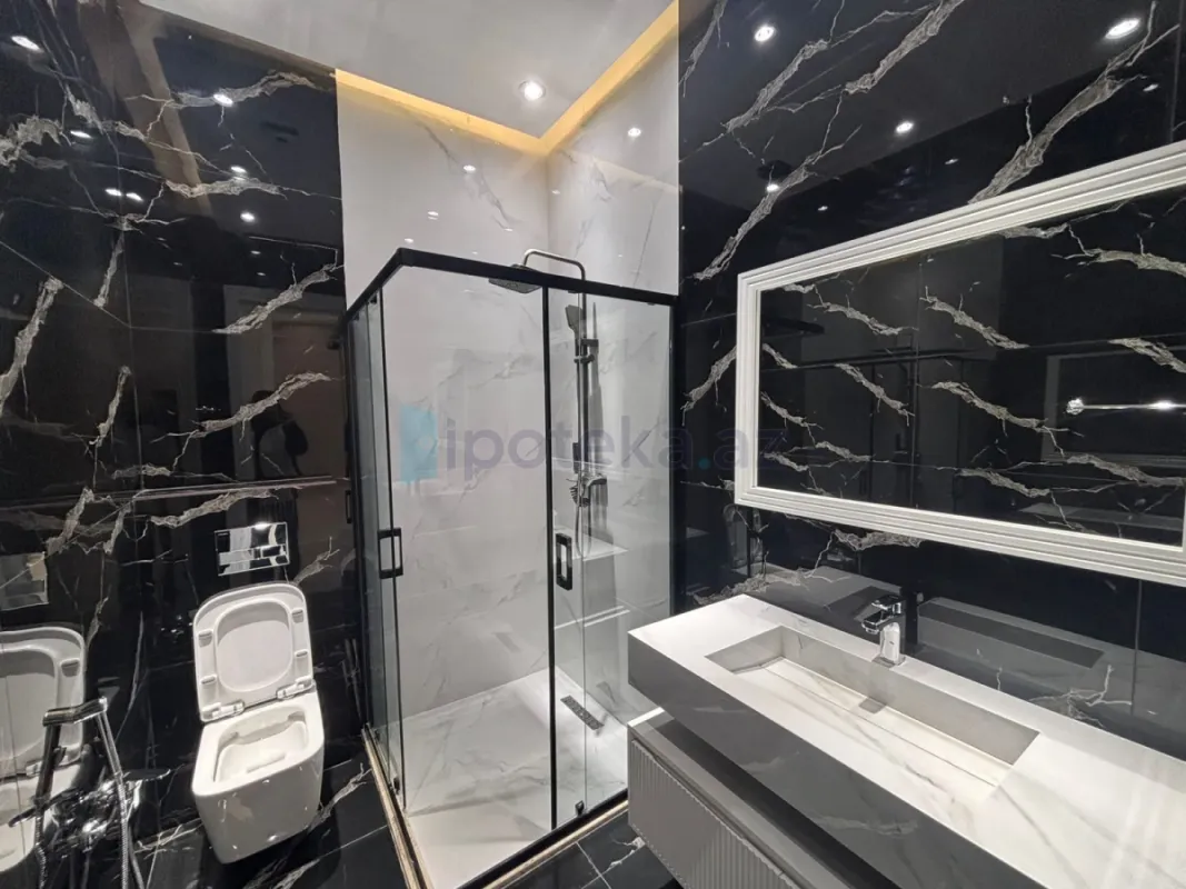 Satılır 4 otaqlı mənzil 145 m²