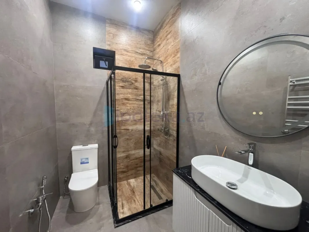 Satılır 4 otaqlı mənzil 165 m²