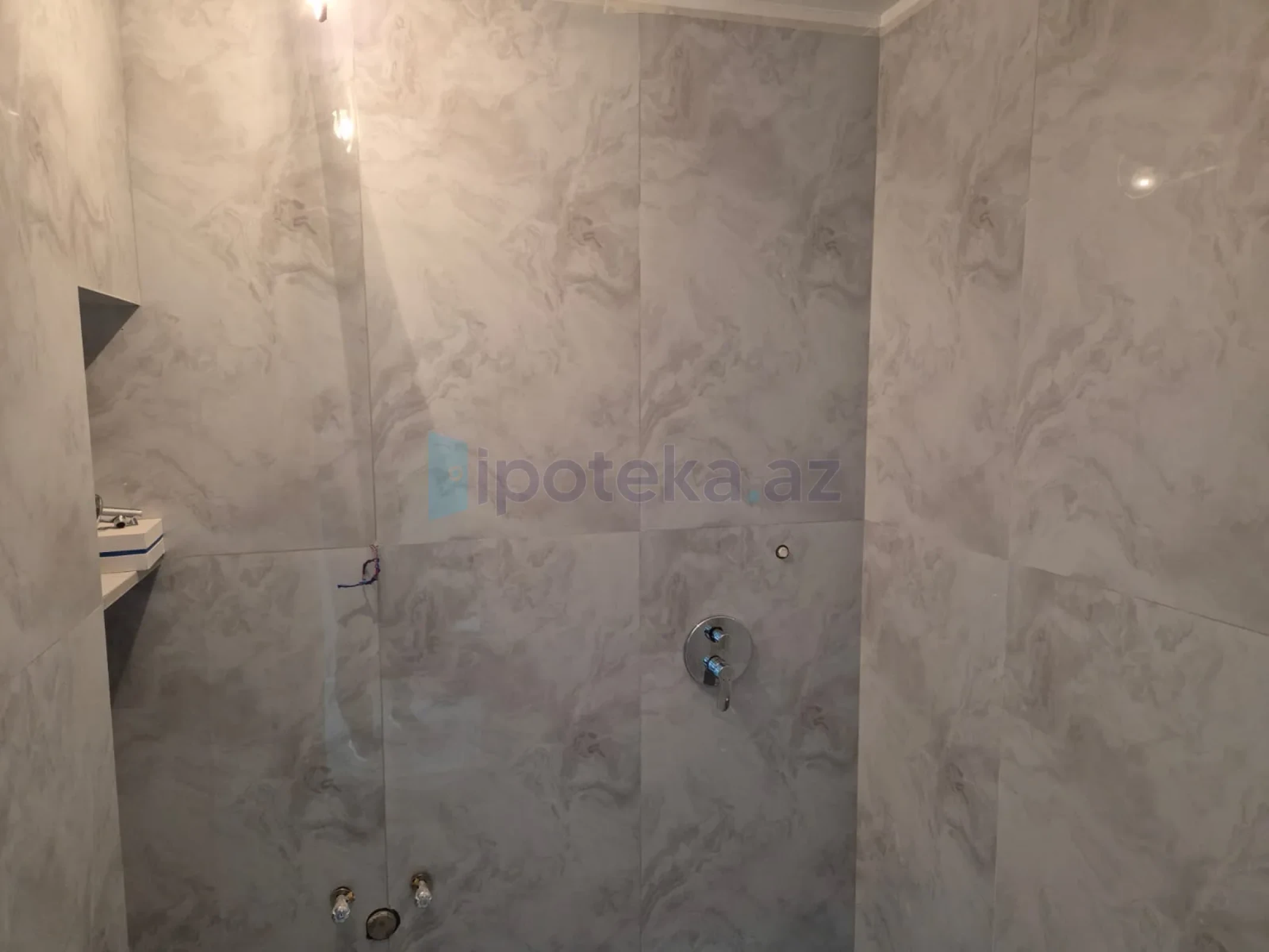 Satılır 2 otaqlı yeni tikili 55 m²