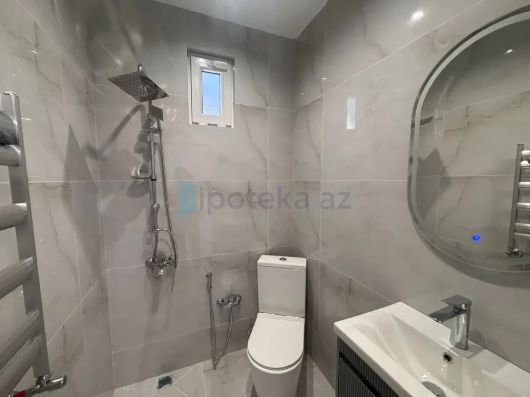 Satılır 4 otaqlı mənzil 130 m²