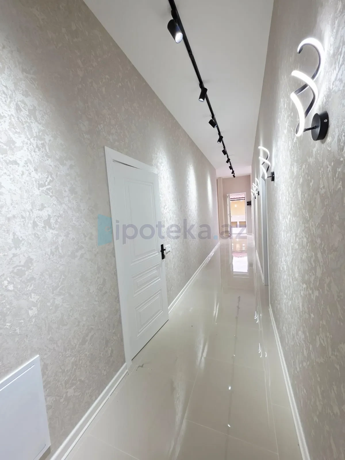 Satılır 4 otaqlı mənzil 150 m²