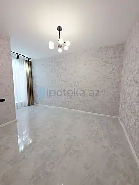Satılır 4 otaqlı mənzil 150 m²