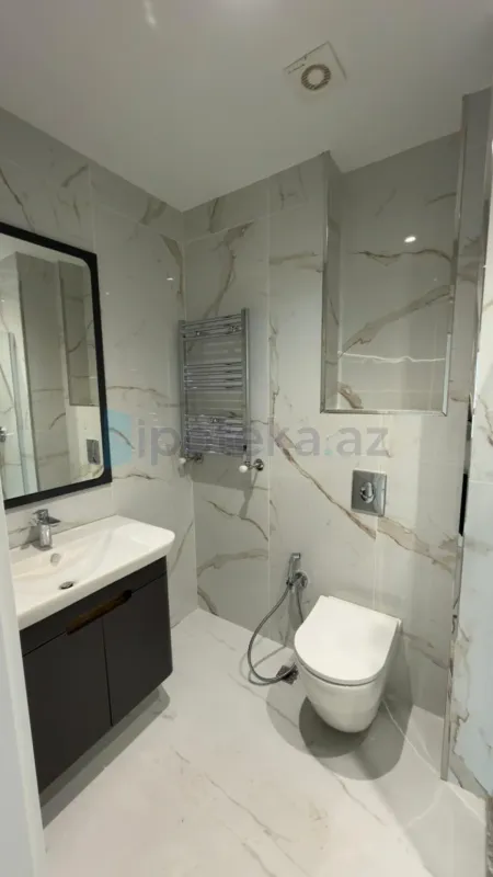 Satılır 2 otaqlı yeni tikili 63 m²