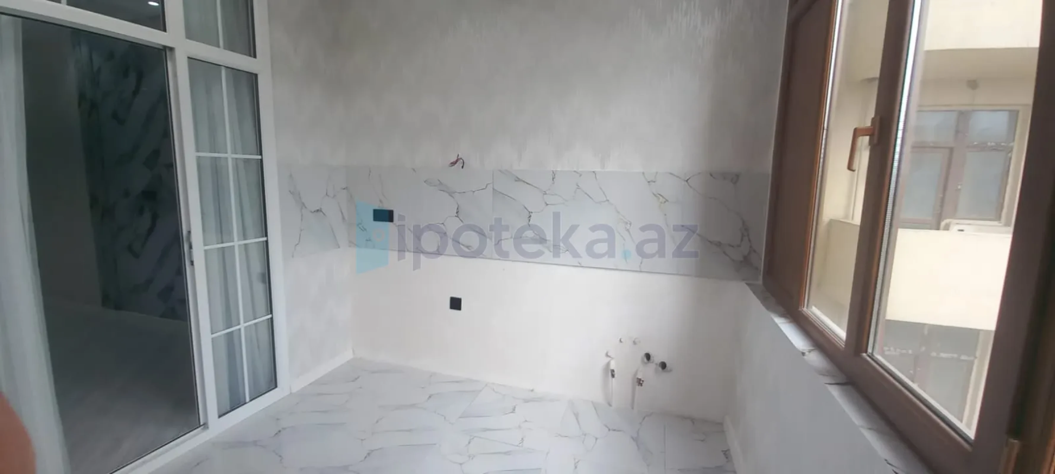 Satılır 4 otaqlı yeni tikili 97 m²