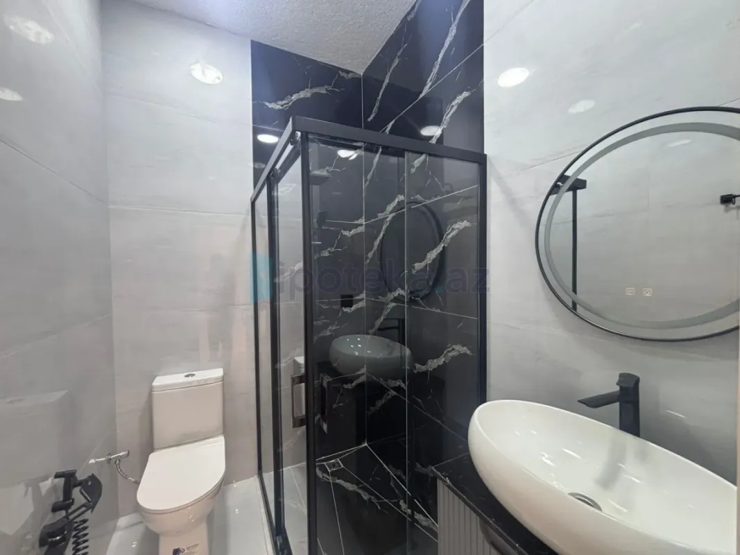 Satılır 4 otaqlı mənzil 145 m²