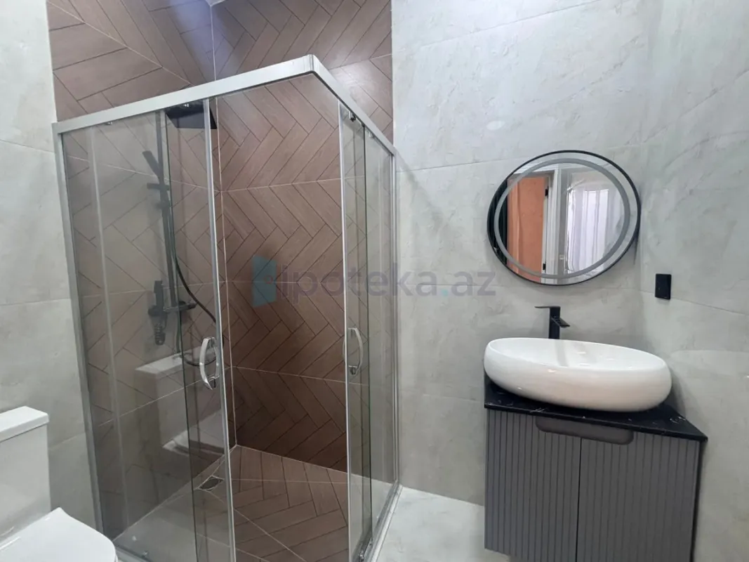 Satılır 4 otaqlı mənzil 145 m²