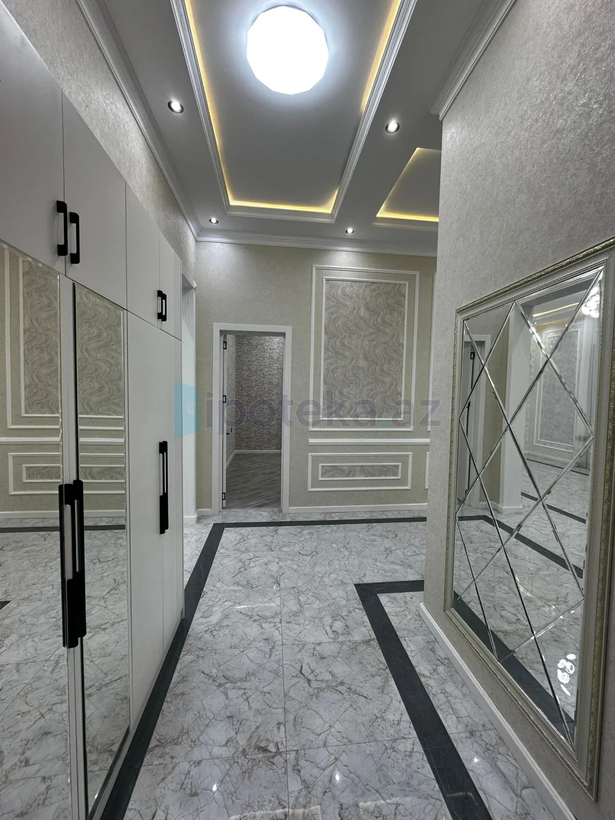 Satılır 4 otaqlı mənzil 150 m²