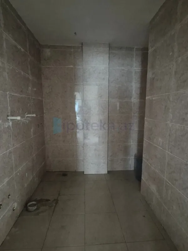 Satılır 3 otaqlı yeni tikili 100 m²