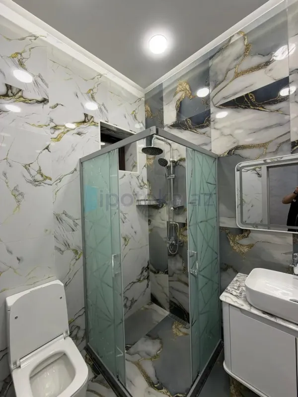 Satılır 4 otaqlı mənzil 150 m²