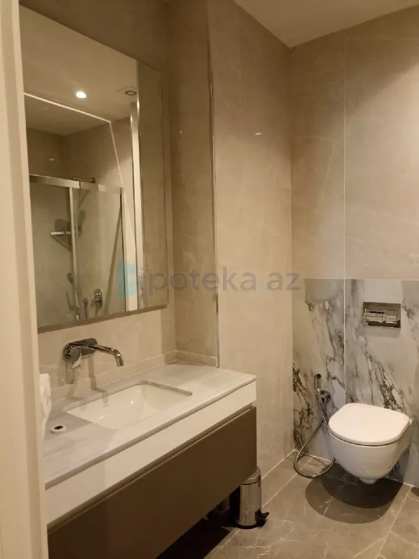 Satılır 2 otaqlı yeni tikili 99.3 m²