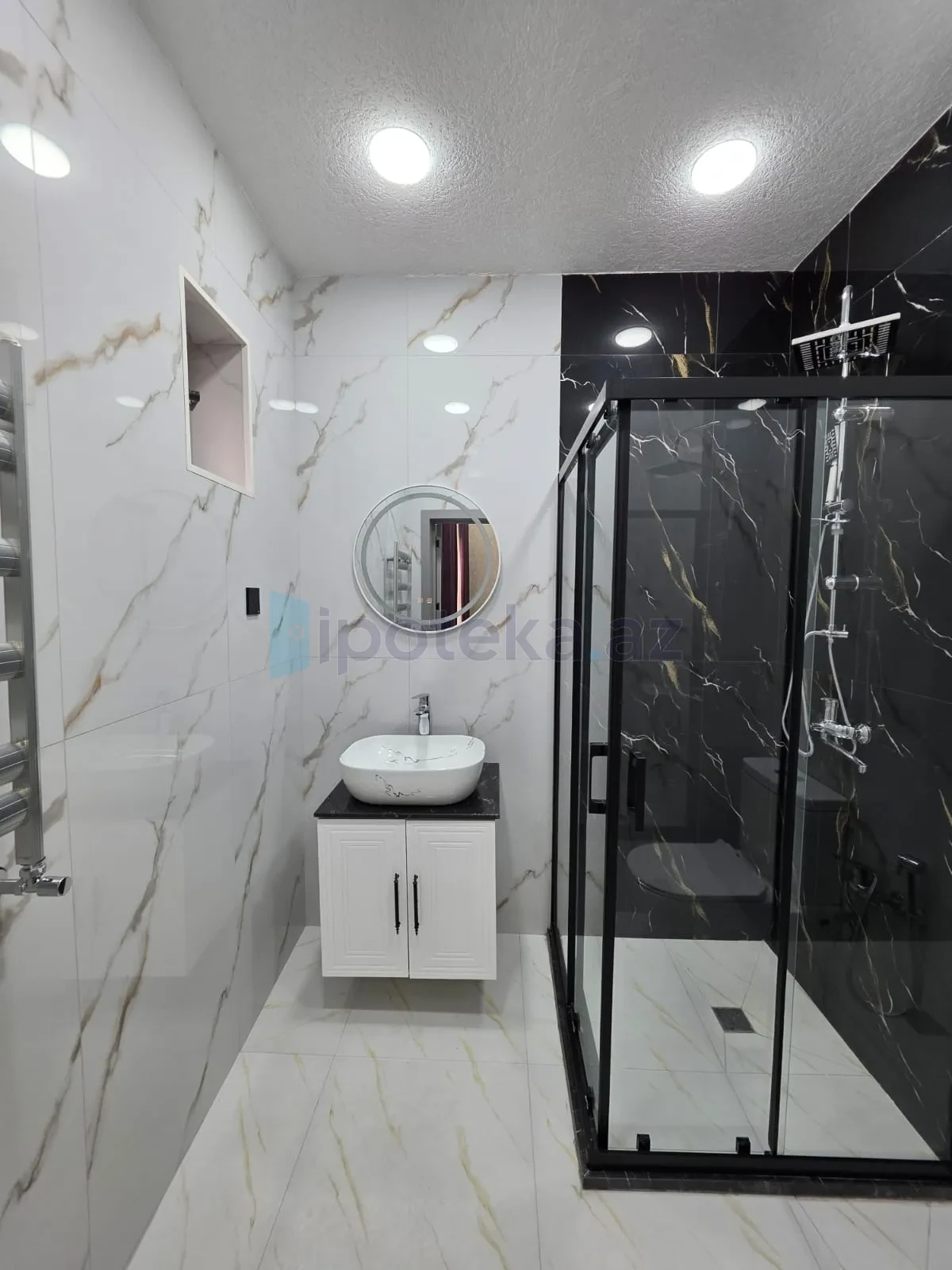 Satılır 4 otaqlı mənzil 150 m²