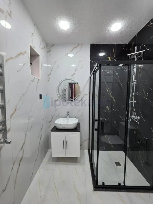 Satılır 4 otaqlı mənzil 150 m²