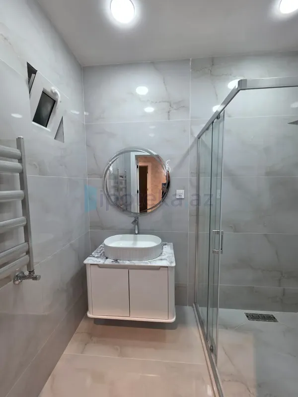 Satılır 4 otaqlı mənzil 140 m²