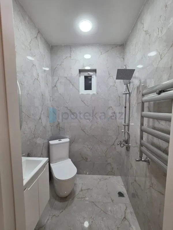 Satılır 4 otaqlı mənzil 140 m²