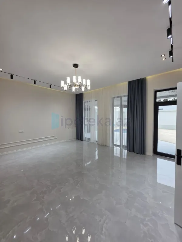 Satılır 4 otaqlı mənzil 165 m²