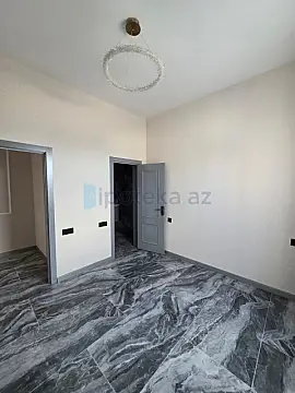 Satılır 4 otaqlı mənzil 135 m²