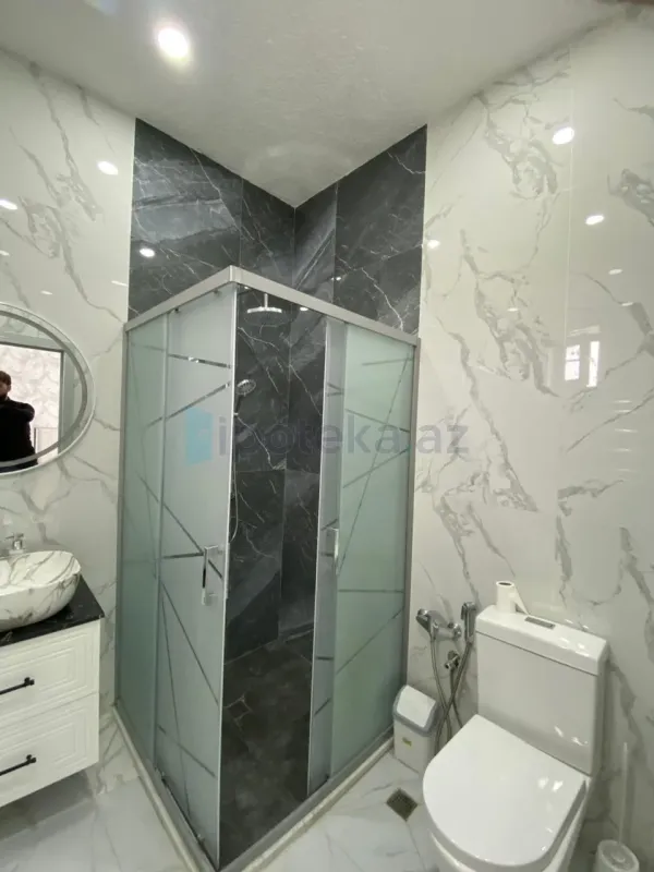 Satılır 4 otaqlı mənzil 150 m²