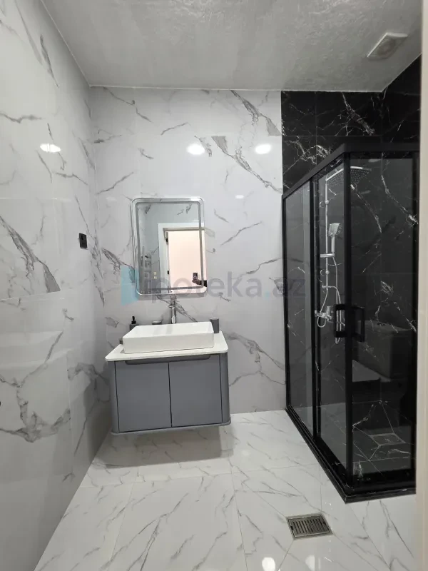 Satılır 4 otaqlı mənzil 140 m²