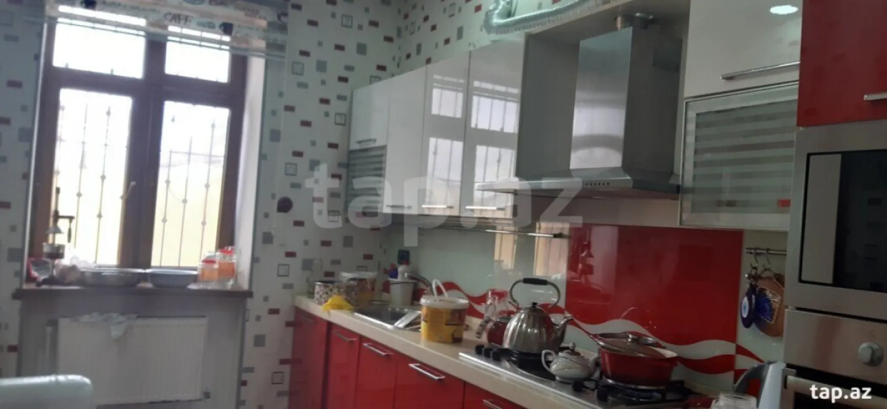 Satılır 12 otaqlı həyət evi